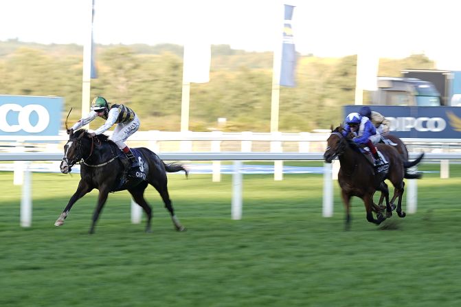 Adam Kirby riding Escobar in The Balmoral Handicap during the QIPCO British Champions Day at Ascot Racecourse.