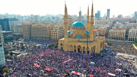 Lebanese protesters rally in central Beirut on Sunday during demonstrations against tax increases and official corruption. 