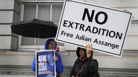 Supporters of Wikileaks founder Julian Assange demonstrate oustside Westminster Magistrates' Court in London.