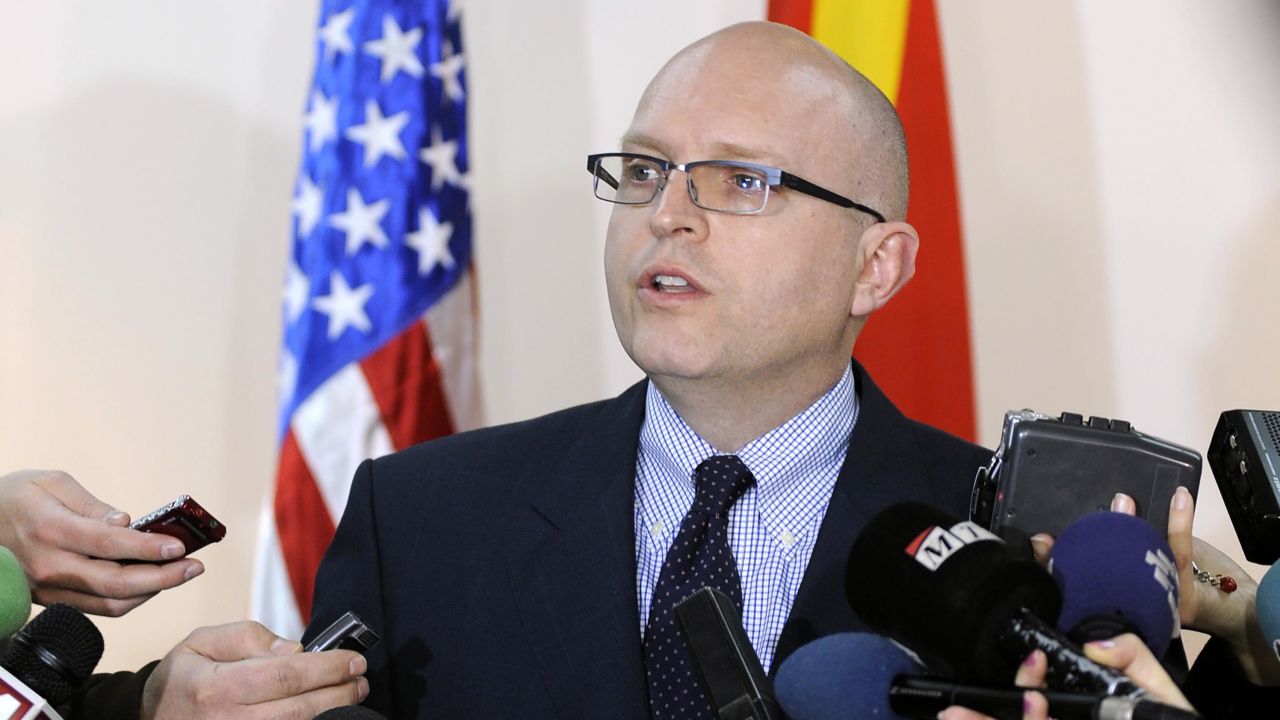 US Deputy Assistant Secretary for European and Eurasian Affairs Philip Reeker, center, talks to media in January 2012.