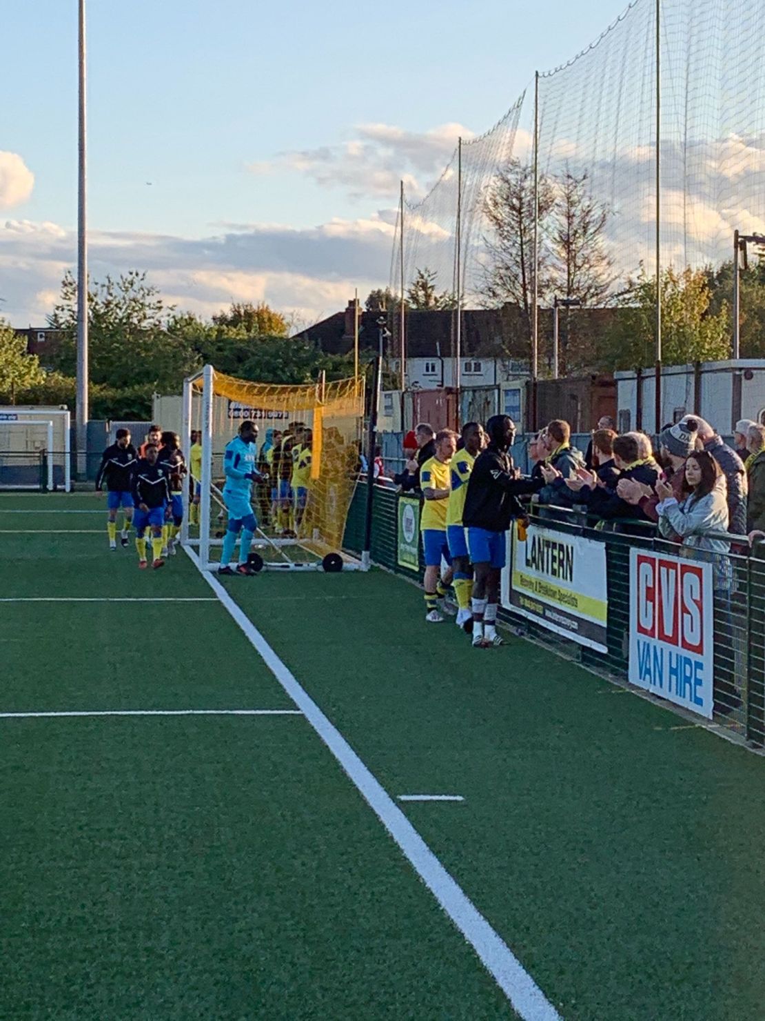 Haringey players shake hands with supporters.