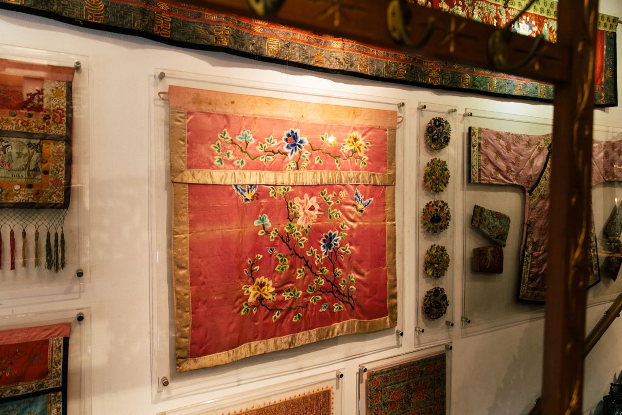 An altar cloth hangs at museum.