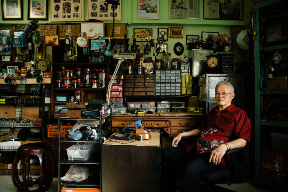Ang still fixes phonographs, gramophones and old phones in his home repair studio. 