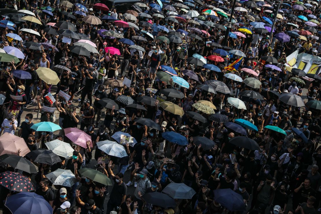 Protesters attend a pro-democracy march in Hong Kong on October 20.