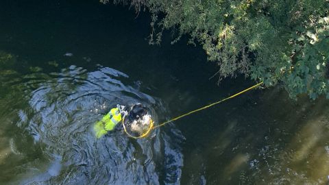 A police diver searches for evidence in the River Spree, close to where Khangoshvili was murdered. 