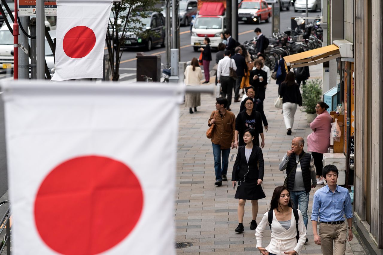 Japanese national flags decorate the streets on Monday, October 21 before Emperor Naruhito's enthronement.