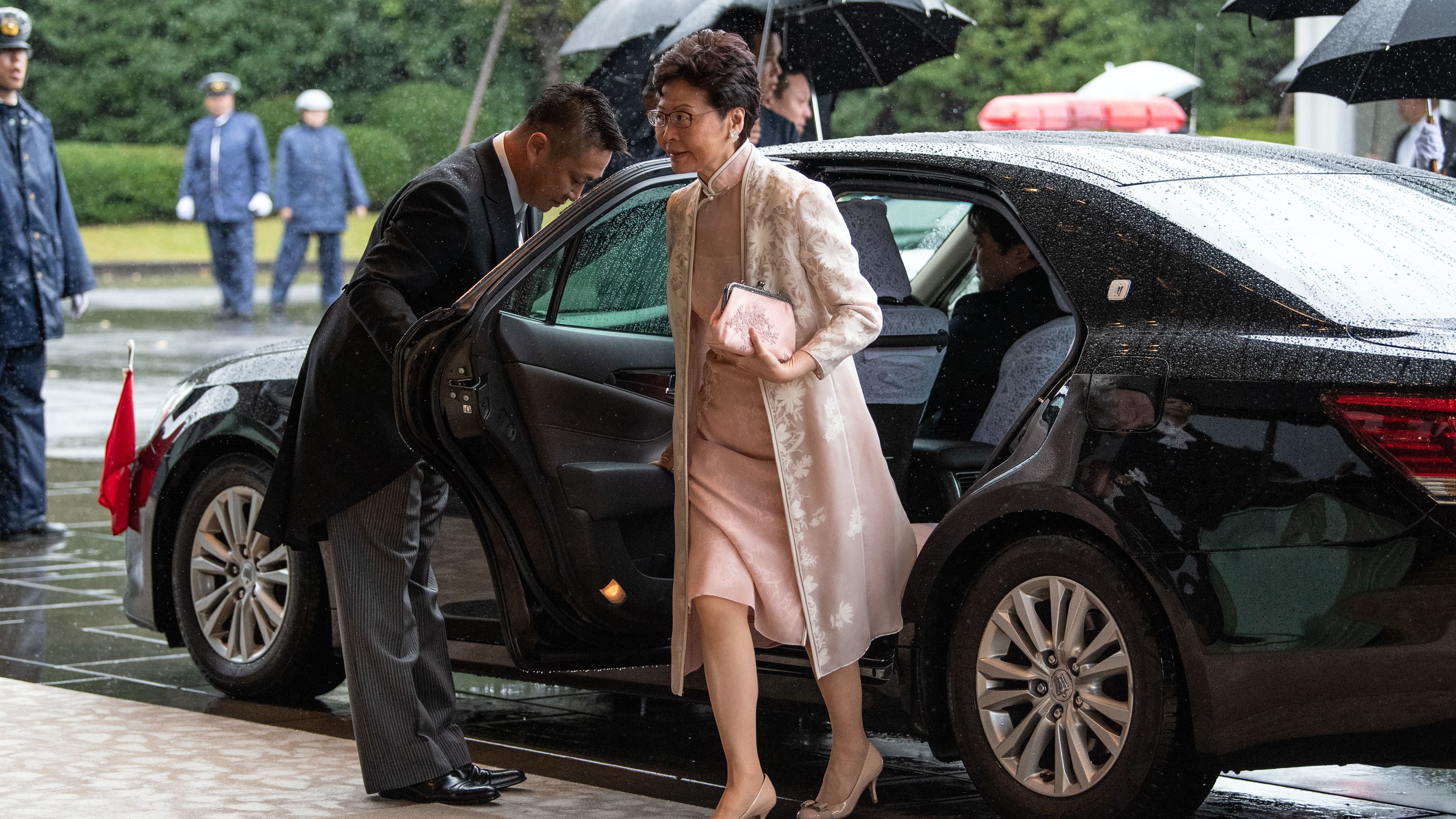 Chief Executive of Hong Kong Carrie Lam arrives at Emperor Naruhito's enthronement ceremony. 