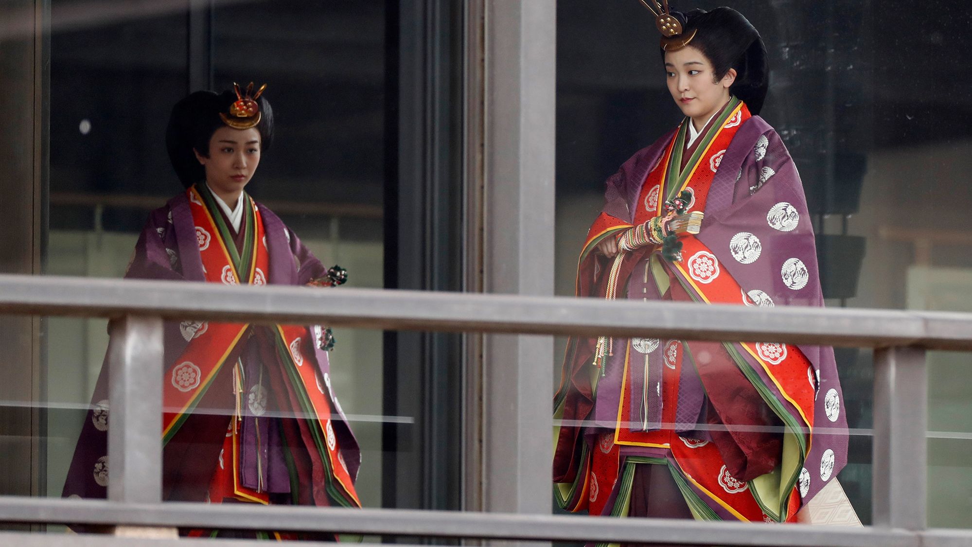 Japan's Princess Kako and Princess Mako arrive for Emperor Naruhito's enthronement ceremony.