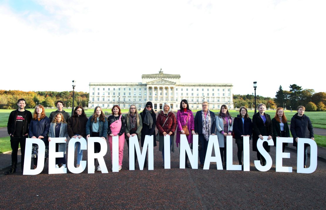 Abortion rights supporters pose outside Stormont in Belfast on Monday. 