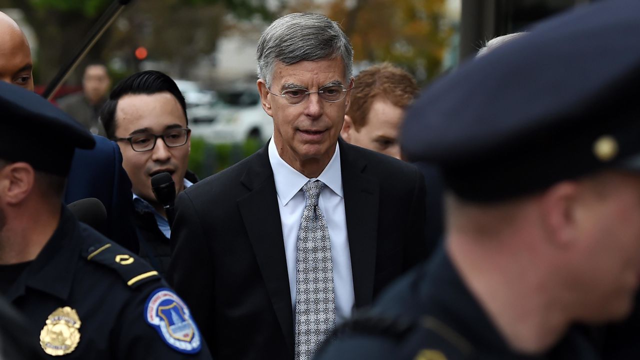 The top US diplomat in Ukraine, Bill Taylor, at center, arrives at the US Capitol to testify behind closed doors for the ongoing impeachment investigation of President Donald Trump on Tuesday.