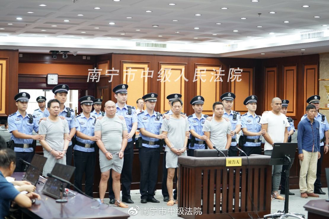The six men were charged with intentional homicide after staging and outsourcing a murder plot in China's southern Guangxi province.