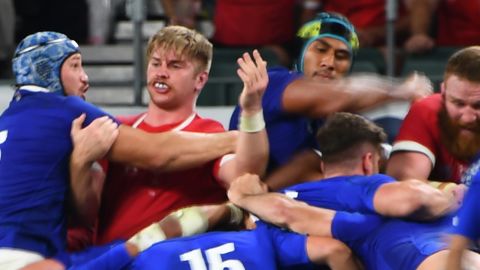 France's lock Sebastien Vahaamahina (black cap) moments before he elbows Wales' flanker Aaron Wainwright (2nd left) in the Rugby World Cup quarterfinal.