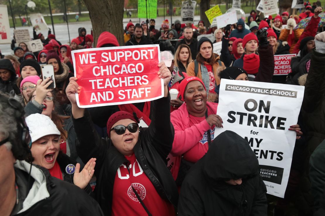 Chicago teachers and supporters rally Tuesday outside Oscar DePriest Elementary School.