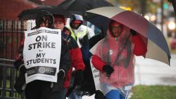 Striking Chicago teachers and their supporters picket outside of Oscar DePriest Elementary School on October 22, 2019 in Chicago, Illinois. 