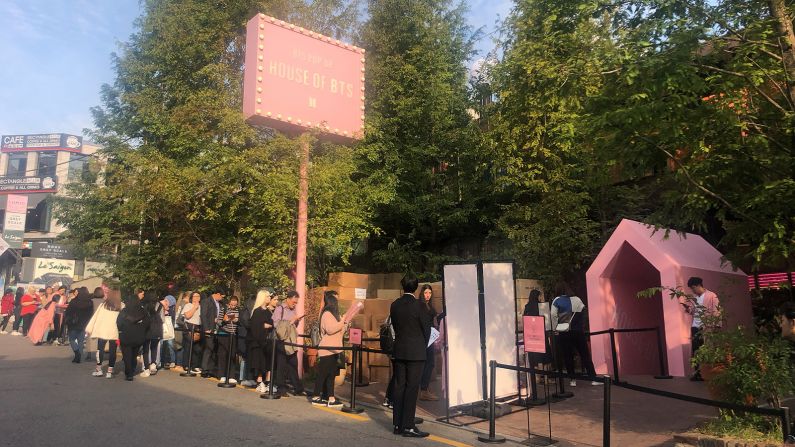 <strong>House of BTS: </strong>A line of fans wait outside BTS's new pop-up store "House of BTS" in Seoul, South Korea on October 21, 2019.