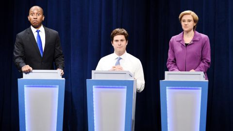 Pictured: (l-r) Chris Redd as Cory Booker, Colin Jost as Pete Buttigieg, and Kate McKinnon as Elizabeth Warren during the "DNC Town Hall" sketch on Saturday, September 28, 2019.