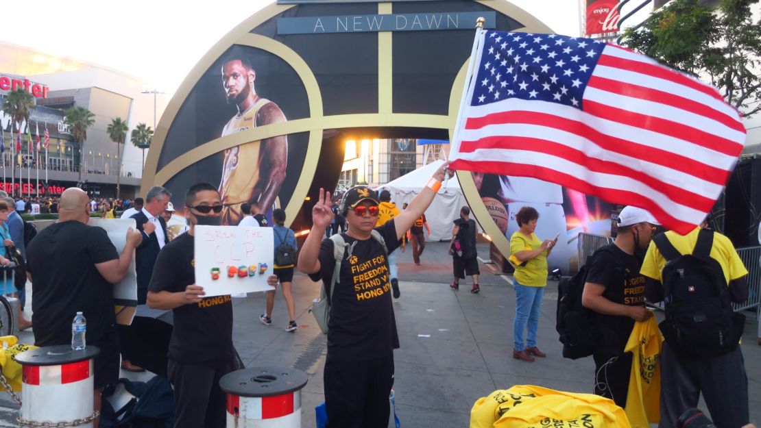 Protesters outside the Staples Center in Los Angeles  wore shirts backing Hong Kong before the game between the Los Angeles Lakers and Los Angeles Clippers on Tuesday. 