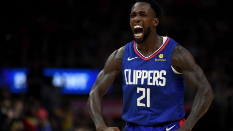 Los Angeles Clippers guard Patrick Beverley celebrates his team's win over their arena-mates the Los Angeles Lakers in the first game of the NBA season. 