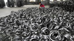 HANGZHOU, CHINA - SEPTEMBER 02: A worker inspects baby stroller steel rims for exporting to America at a workshop in Tianmushan town on September 2, 2019 in Hangzhou, Zhejiang Province of China. (Photo by VCG/VCG via Getty Images)