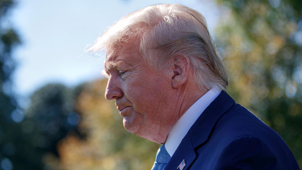 President Donald Trump turns toward the Marine One helicopter after speaking to members of the media on leaving the White House, Wednesday, October 23.