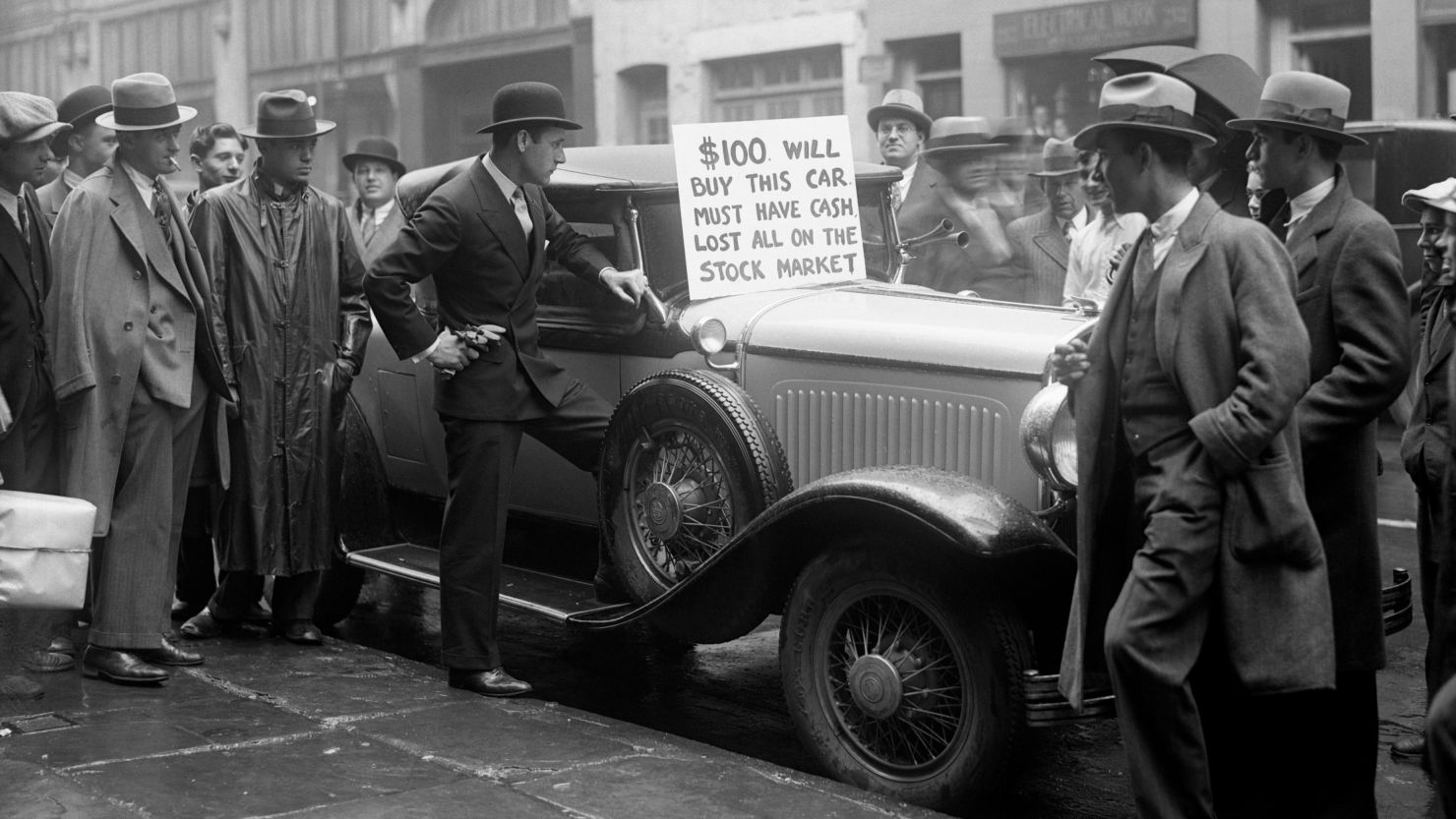 A Wall Street speculator tries to sell his car after losing all his money in the stock market crash.