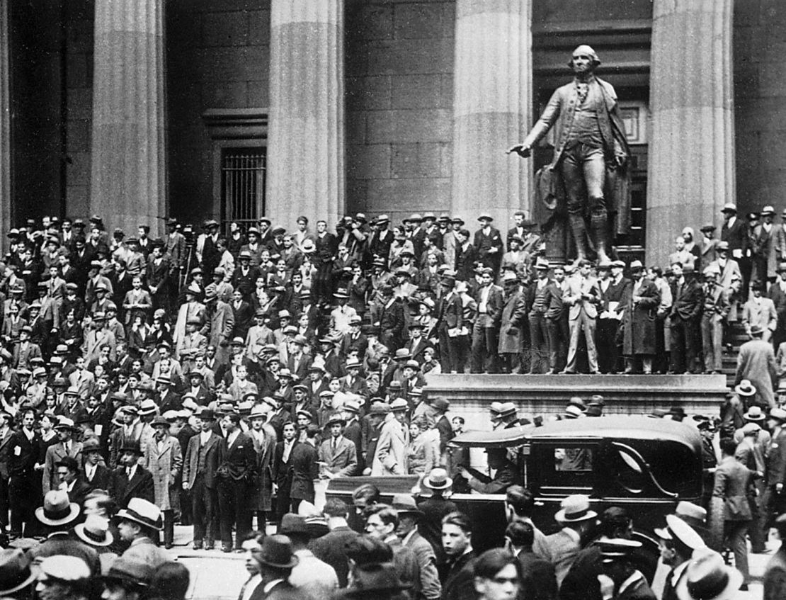 After news of the Wall Street crash, a crowd of speculators, worried about the fall of their financial securities, gathers in front of the New York Stock Exchange.
