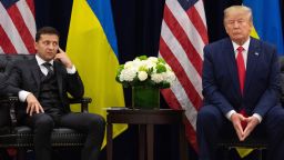 TOPSHOT - US President Donald Trump and Ukrainian President Volodymyr Zelensky looks on during a meeting in New York on September 25, 2019, on the sidelines of the United Nations General Assembly. (Photo by SAUL LOEB / AFP) (Photo by SAUL LOEB/AFP via Getty Images)