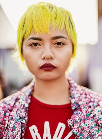 A woman with yellow hair in New Delhi. Scroll through the gallery to see more of Scott Schuman's street photography.