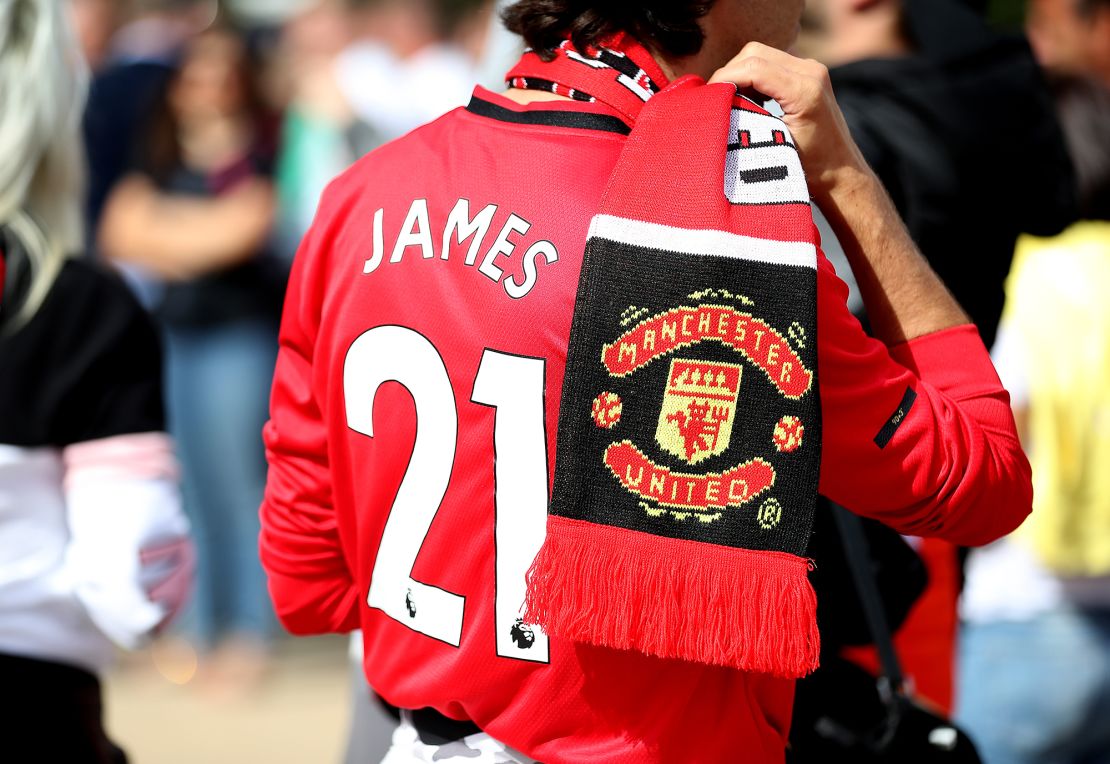 A Manchester United fan wears a Daniel James shirt ahead of the Premier League match at Old Trafford, Manchester.