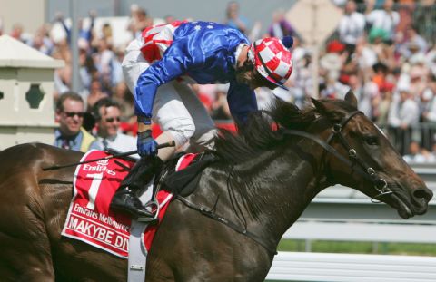 Jockey Glen Boss crosses the line in first place on Makybe Diva during the 2005 Melbourne Cup. Boss and Makybe Diva won three Cups in a row between 2003 and 2005.