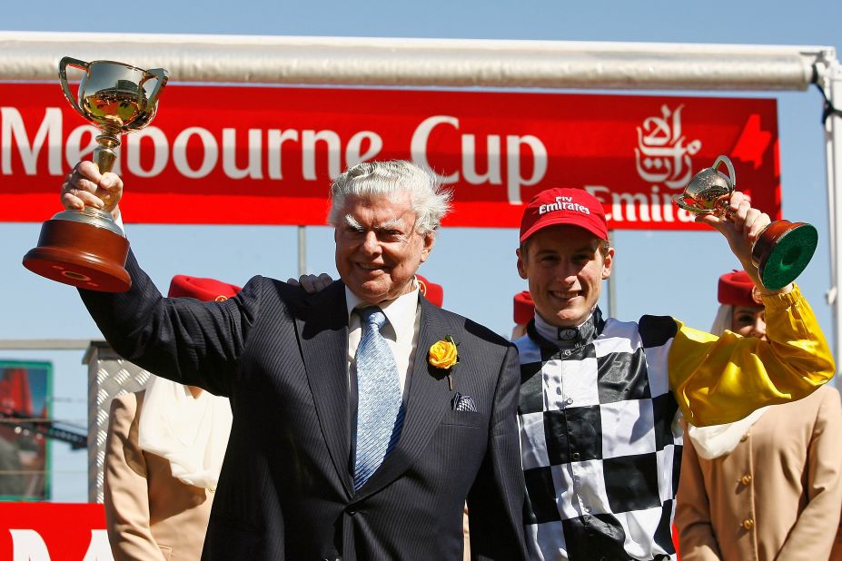 Bart Cummings (left), the most successful trainer in Melbourne Cup history with 12 wins, poses with jockey Blake Shinn their horse Viewed ran to victory in 2008.