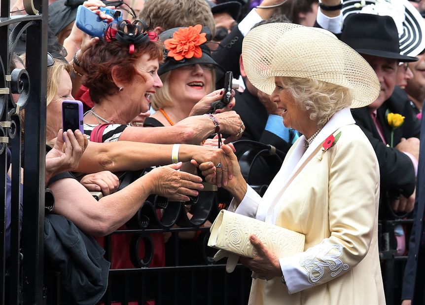 Even royalty partake in the revelry. In 2012 Camilla, Duchess of Cornwall greets racegoers.