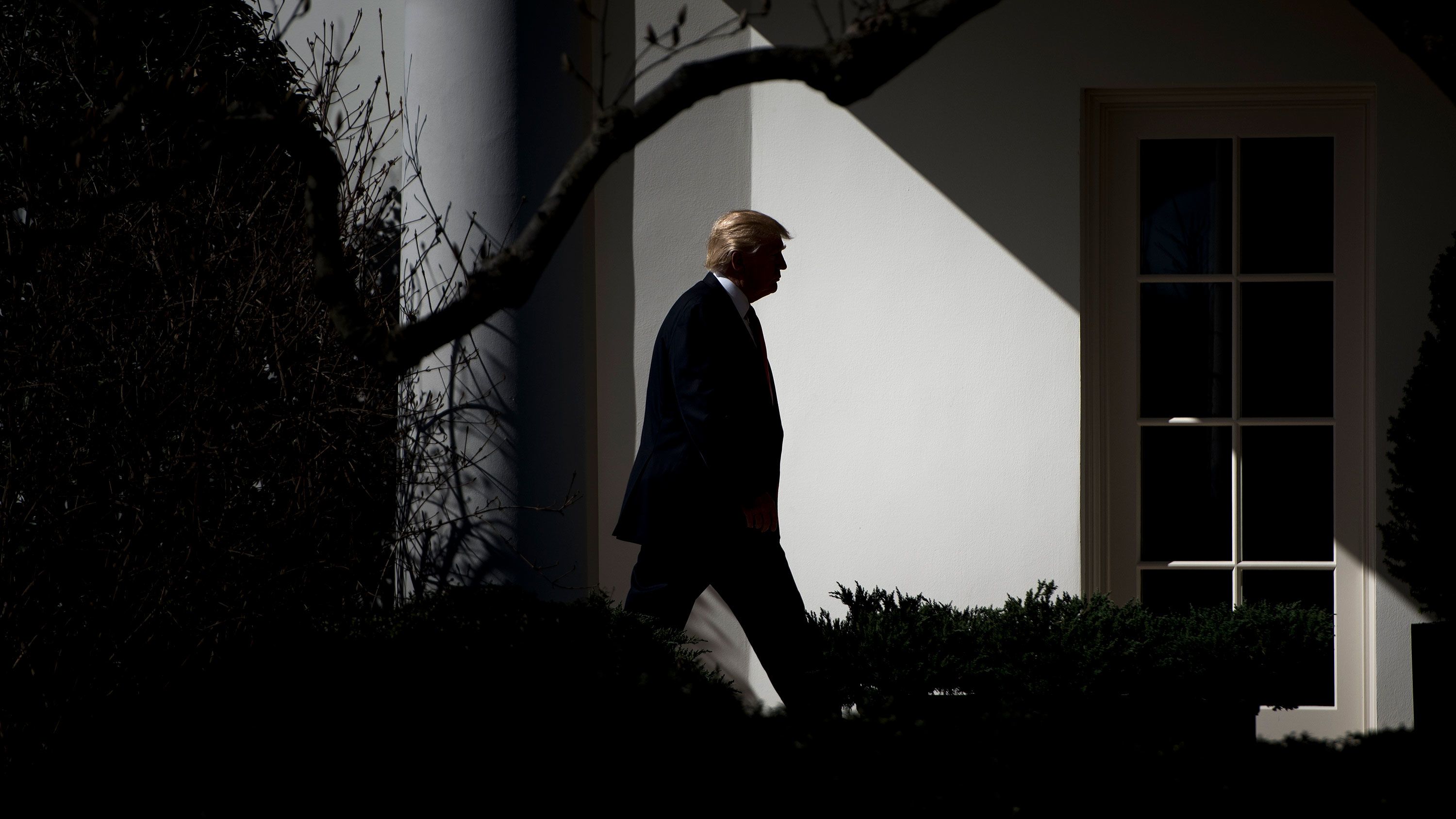 TOPSHOT - US President Donald Trump walks from Marine One to the White House February 24, 2017 in Washington, DC. / AFP / Brendan Smialowski        (Photo credit should read BRENDAN SMIALOWSKI/AFP/Getty Images)