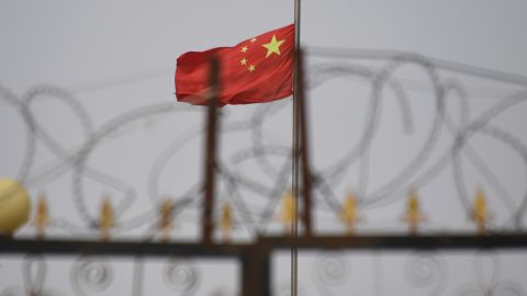 The Chinese flag at a housing compound in Yangisar, in China's western Xinjiang region. 