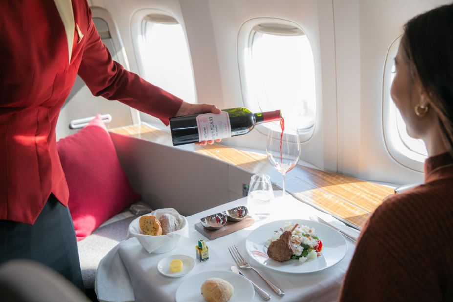 <strong>Cathay Pacific</strong>: First-class guests enjoy dinner from an Asian or a Western menu, an exclusive Champagne bar and exquisite service.