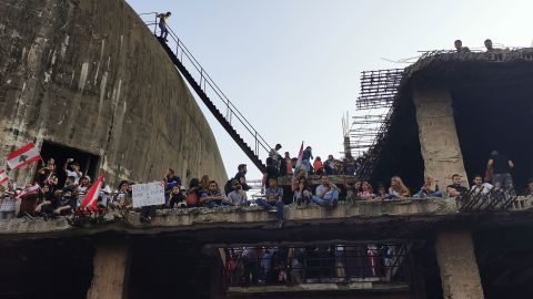 For over a week, protesters have taken over abandoned structures long shut off to the public.