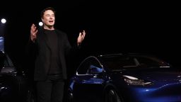 Elon Musk, co-founder and chief executive officer of Tesla Inc., speaks during an unveiling event for the Tesla Model Y crossover electric vehicle in Hawthorne, California, U.S., on Friday, March 15, 2019. Musk said the cheaper electric crossover sports utility vehicle (SUV) will be available from the spring of 2021. The vehicle's price will start at $39,000, a longer-range version will cost $47,000. Photographer: Patrick T. Fallon/Bloomberg via Getty Images