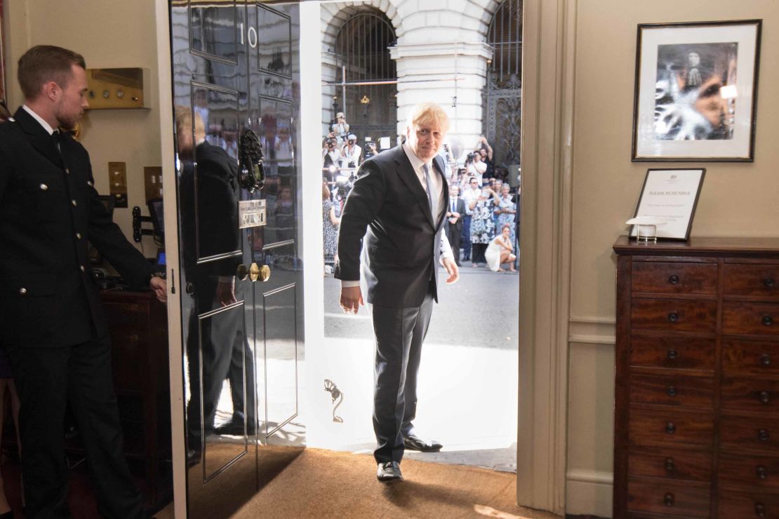 Boris Johnson is seen entering 10 Downing Street on the day he was formally appointed British prime minister in 2019. 