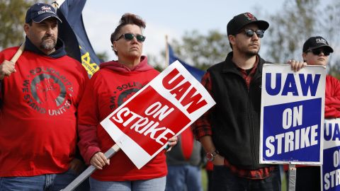 United Auto Workers union member and their families rally near the General Motors Flint Assembly plant on October 13, 2019 in Flint, Michigan. 