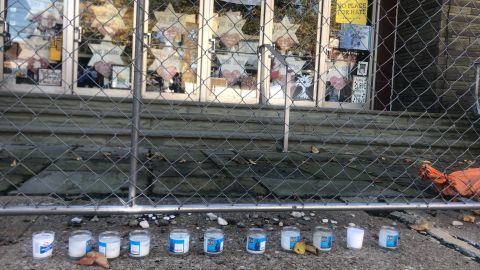Eleven memorial candles for the victims remain outside the Tree of Life synagogue.