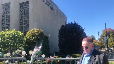Judah Samet passes by the Tree of Life synagogue, which has been shuttered since the attack.