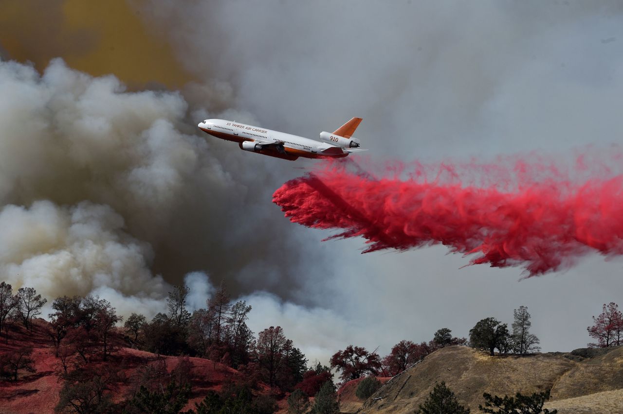 A firefighting aircraft intervenes over Sonoma County, California, where the Kincade Fire was burning on October 25.