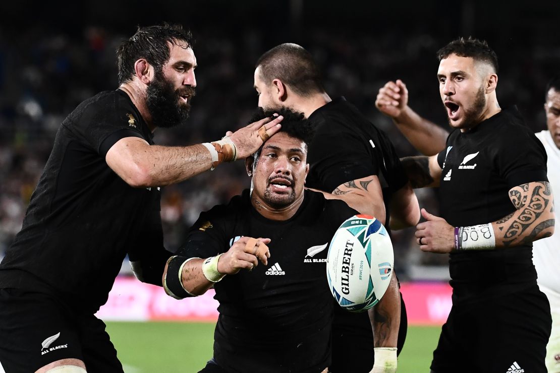 New Zealand's flanker Ardie Savea is congratulated by teammates after scoring his second half try which briefly boosted the All Blacks. 
