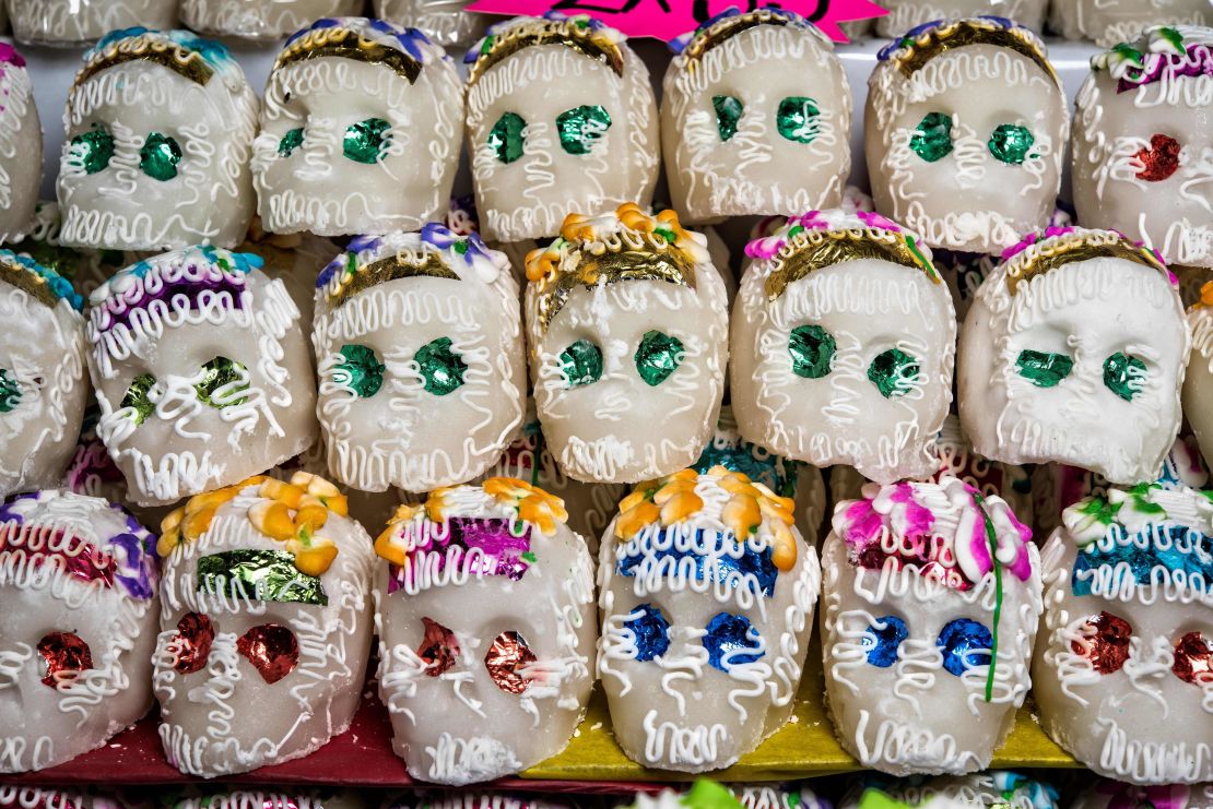 Skulls made and decorated with sugar decorate altars and are given as gifts for Día de los Muertos.