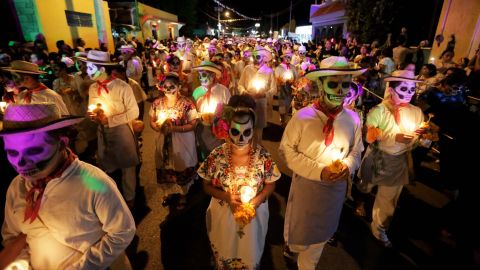 The Day of the Dead parades and costumes are meant to celebrate life rather than be spooky.