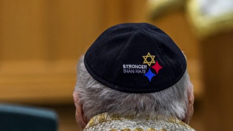 Yarmulkes embroidered with a version of the Pittsburgh Steelers logo are worn at the service.