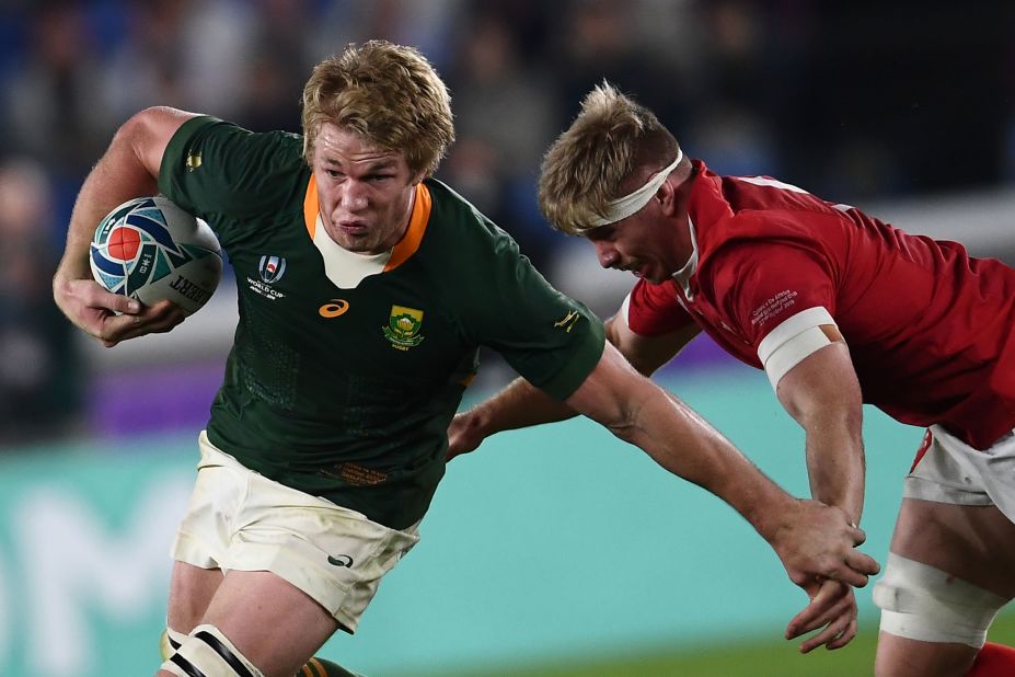Wales takes on South Africa in the second semifinal in Yokohama Sunday. Welshman Aaron Wainwright (right) tackles Springbok flanker Pieter-Steph Du Toit.