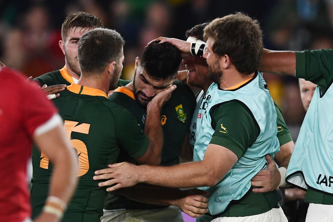 South African players celebrate Damian de Allende's try. 