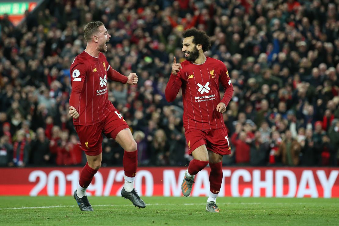 Mohamed Salah's second-half penalty helped Liverpool defeat Tottenham 2-1 at Anfield. 