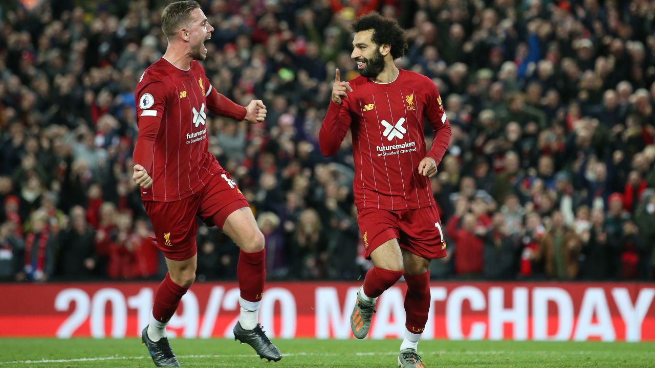 Mo Salah's second-half penalty helped Liverpool defeat Tottenham at Anfield. 